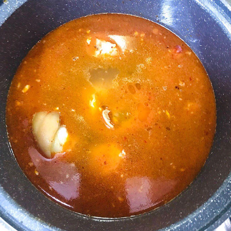 Step 5 Cooking broth for Quang noodles with pig's trotter