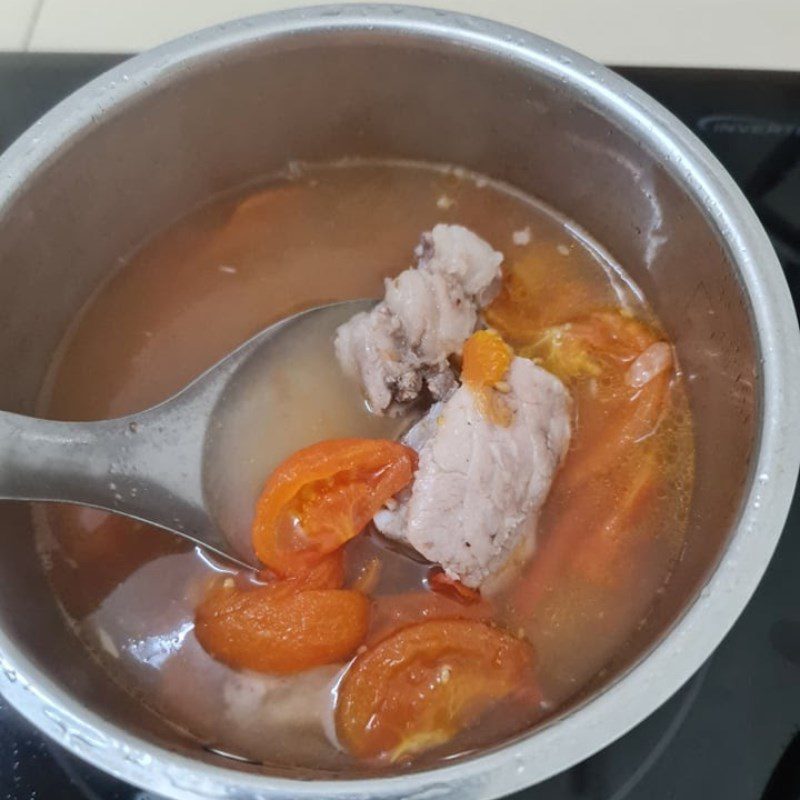 Step 4 Cook the broth and finish Snail noodle soup with tender ribs