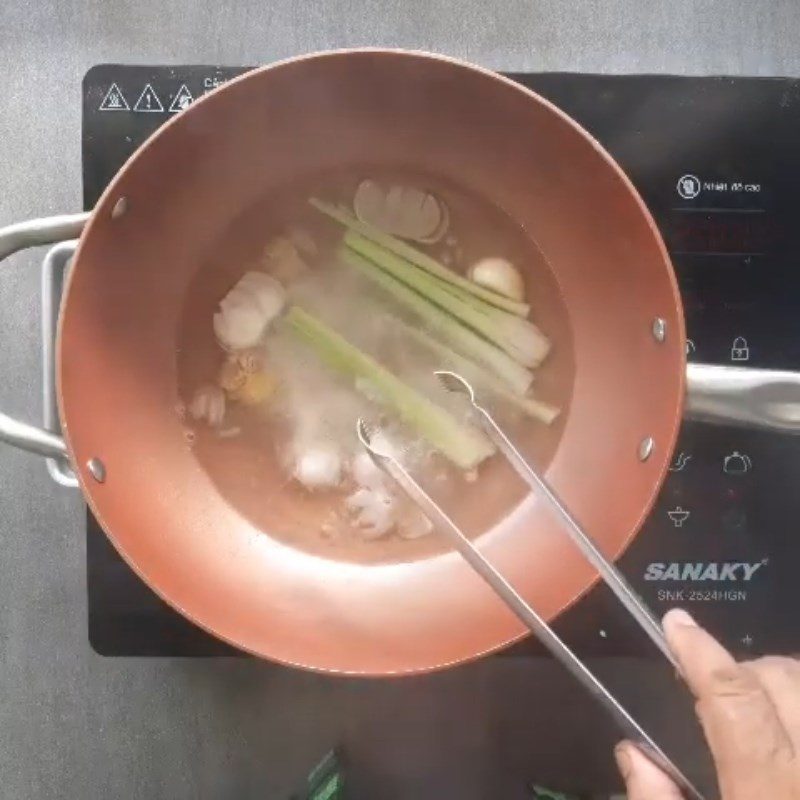 Step 1 Prepare the seasoning water for Sour Bamboo Shoot Beef Bone Soup