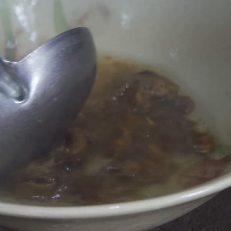 Step 3 Cook the tamarind water Sour fish soup with water spinach