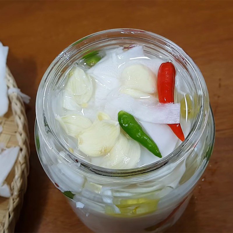 Step 3 Cook the soaking water and soak the bamboo shoots Sour bamboo shoots with garlic and chili