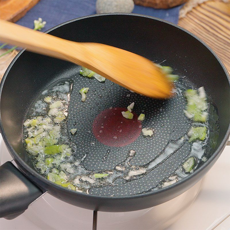 Step 5 Cooking the plum sauce How to make tofu wrapped with lotus seeds in plum sauce