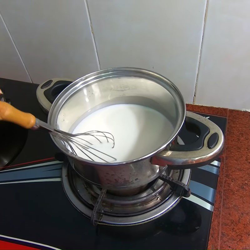 Step 1 Cook milk and mix yogurt for Cocoa Coconut Smoothie