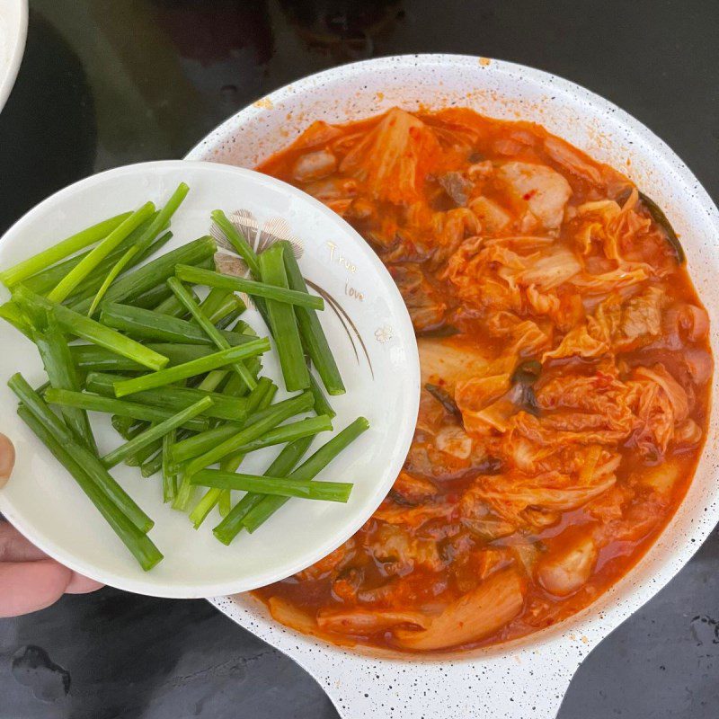 Step 3 Cooking pork with kimchi Pork cooked with kimchi