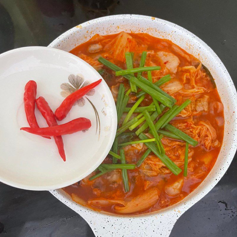 Step 3 Cooking pork with kimchi Pork cooked with kimchi