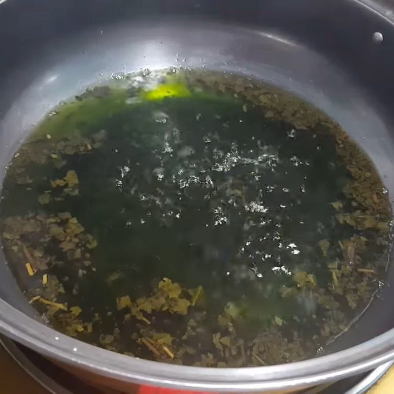 Step 1 Boil Thai green tea Tapioca pearls flavored with Thai tea