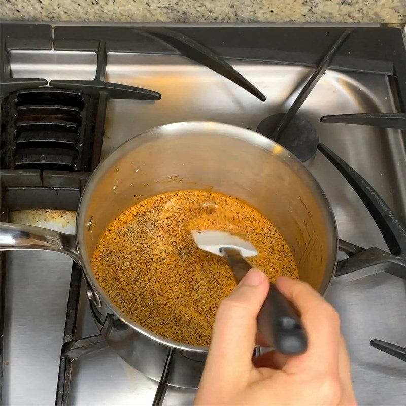 Step 1 Cook and Strain Milk Cream with Thai Tea Thai Milk Tea Ice Cream with Peanuts