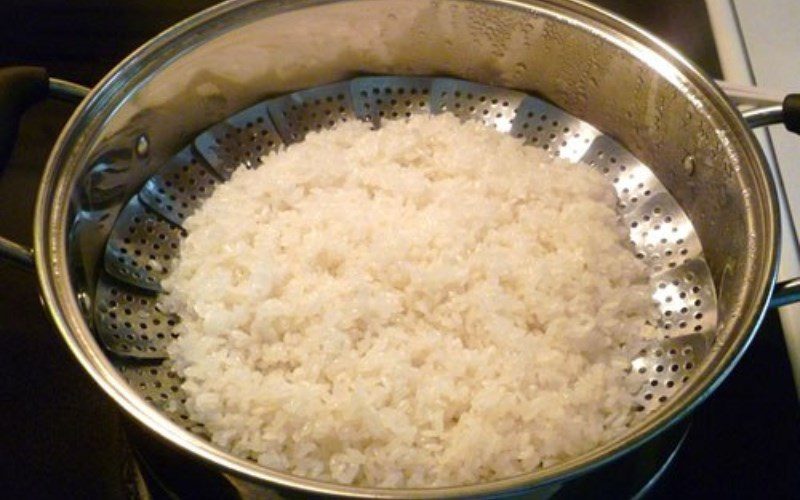 Steam sticky rice twice