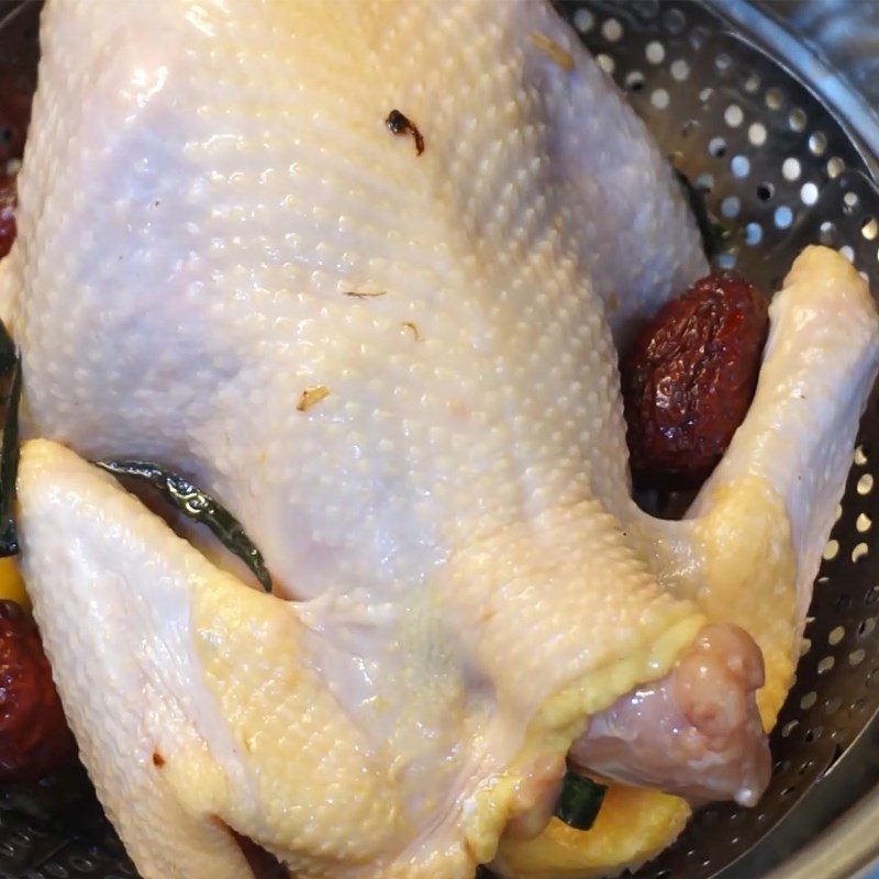 Step 6 Stuffing ingredients and steaming the chicken Chicken wrapped in sticky rice with pigweed sauce