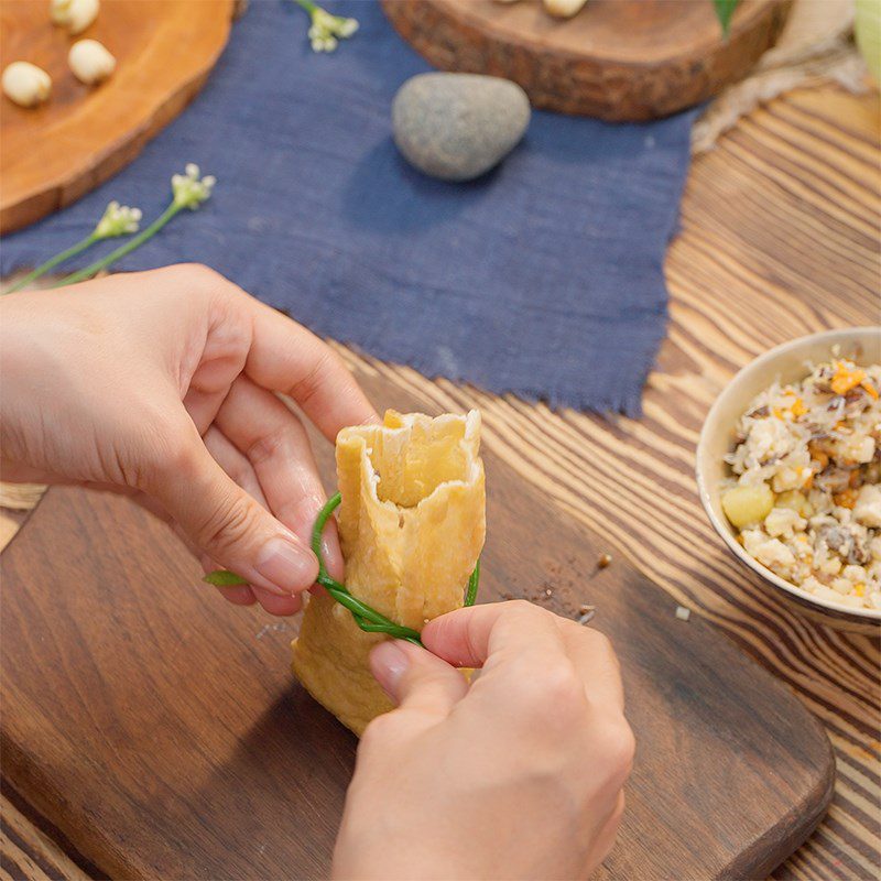 Step 3 Stuffing the tofu How to make tofu wrapped with lotus seeds in plum sauce