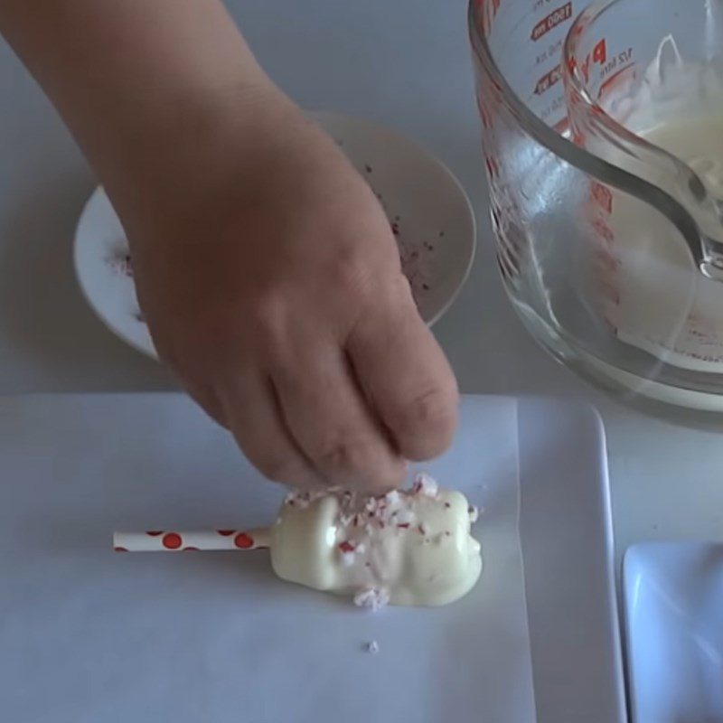 Step 4 Dipping chocolate and decorating White chocolate dipped marshmallow