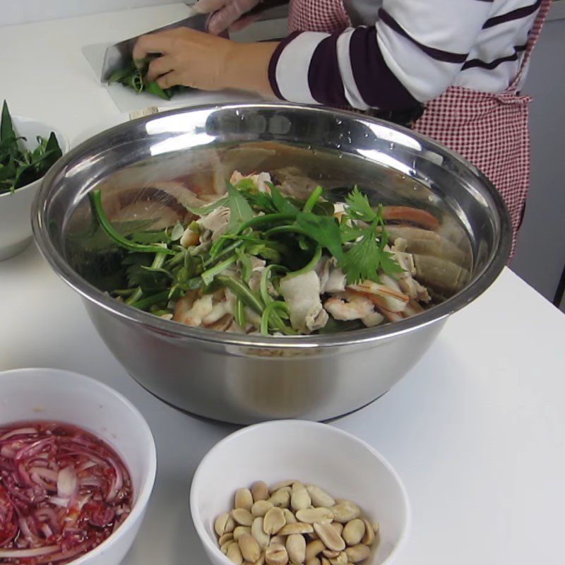 Step 5 Tossing the salad for King’s Vegetable Salad with shrimp and pork