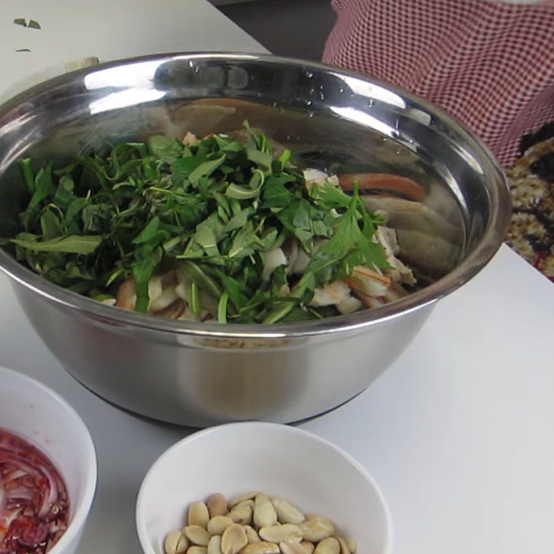 Step 5 Tossing the salad for King’s Vegetable Salad with shrimp and pork