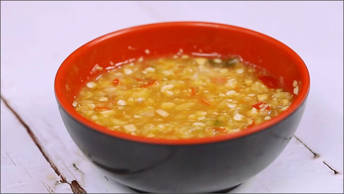 Garlic chili dipping sauce with coriander roots and peanuts