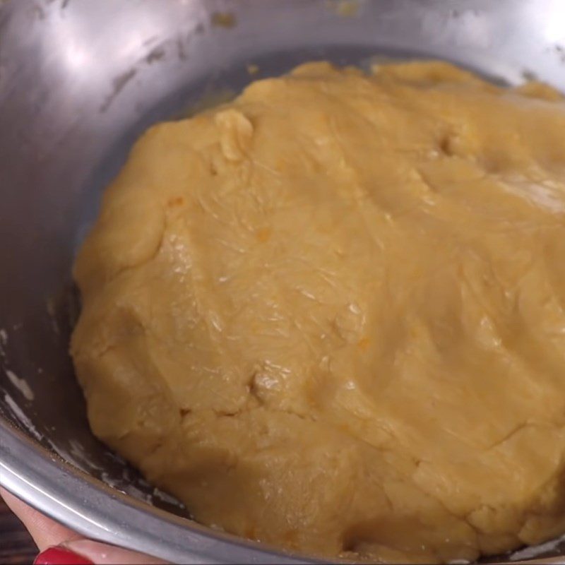 Step 5 Mixing cake dough Mooncake with black sesame and salted egg