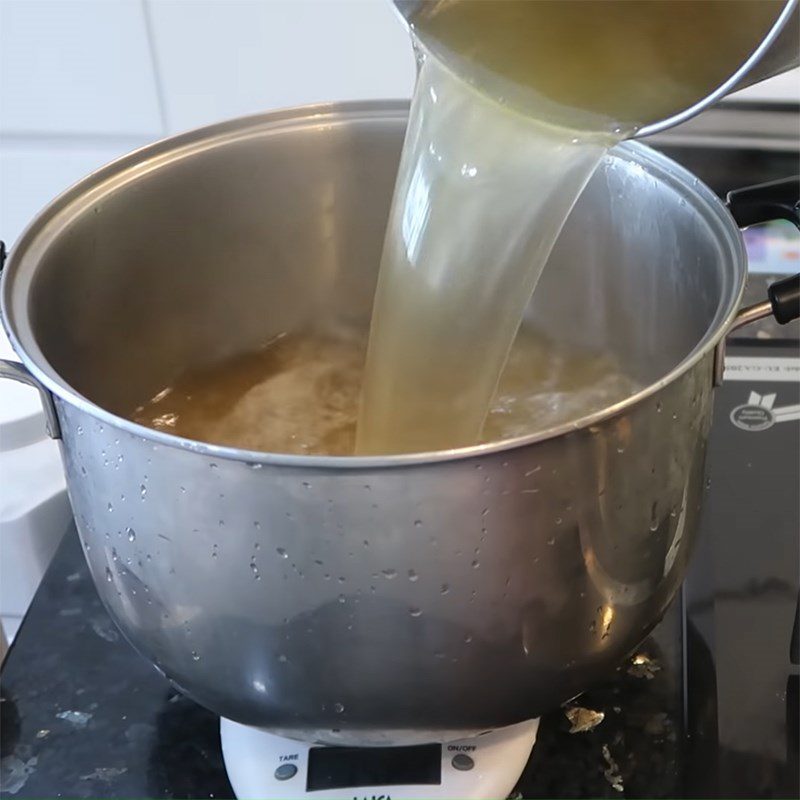 Step 4 Strain the broth for bone-free beef pho