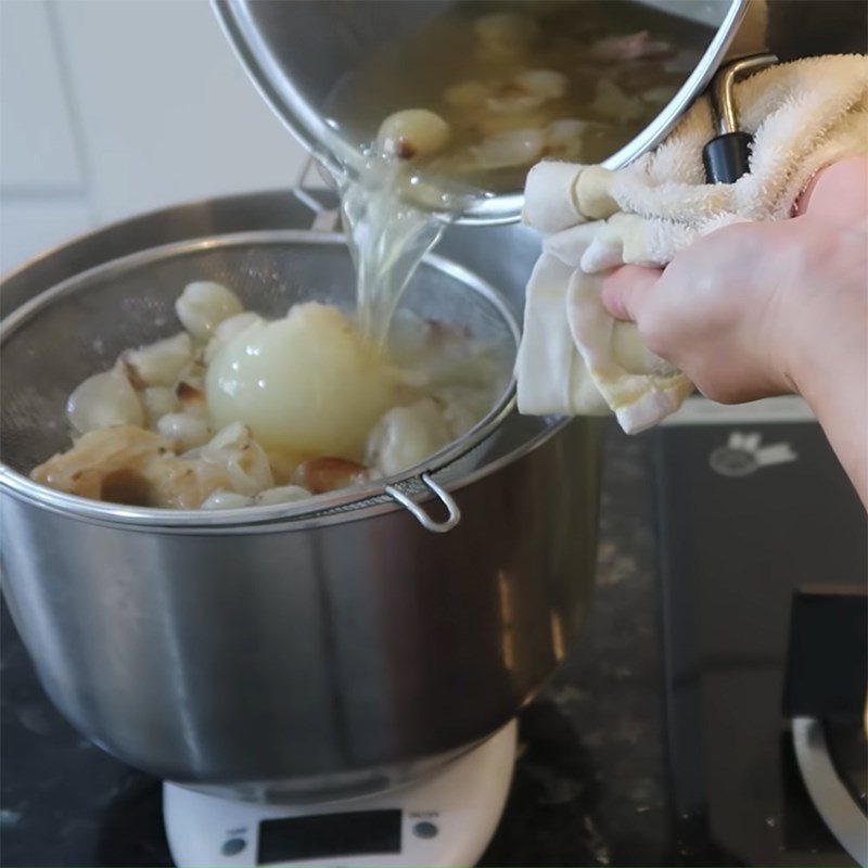 Step 4 Strain the broth for bone-free beef pho