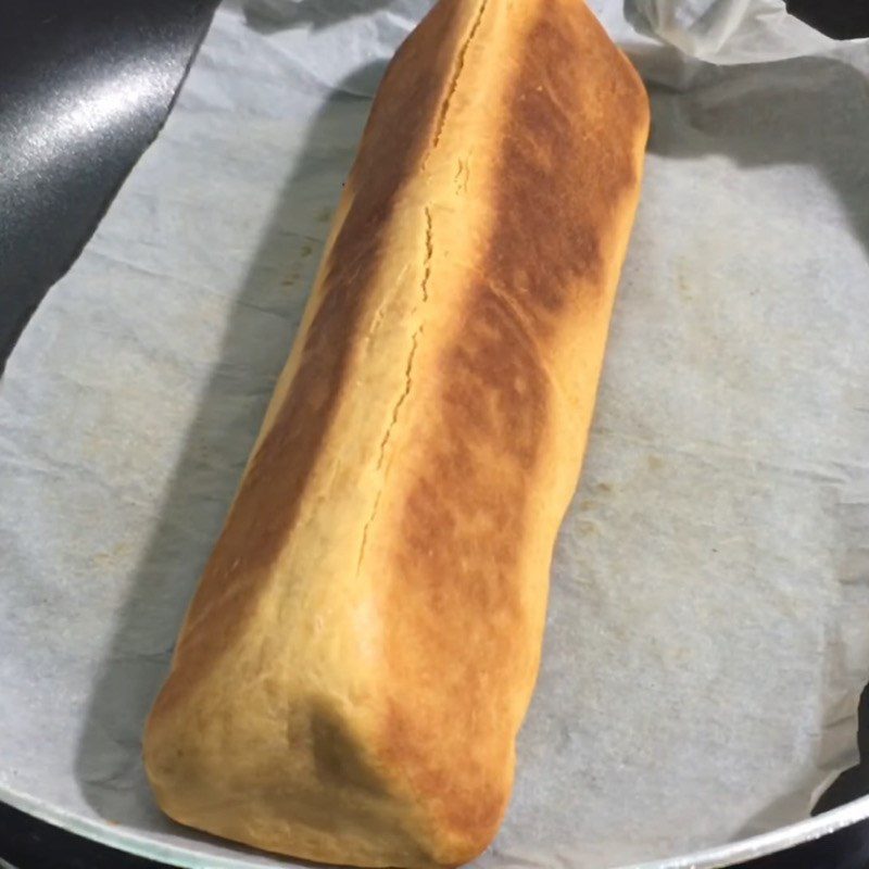 Step 4 Baking cake in a pan Coconut filling cake baked in a non-stick pan