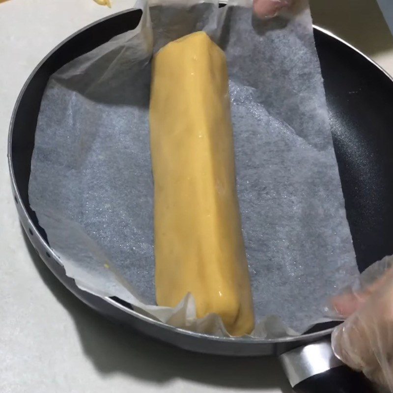 Step 4 Baking cake in a pan Coconut filling cake baked in a non-stick pan