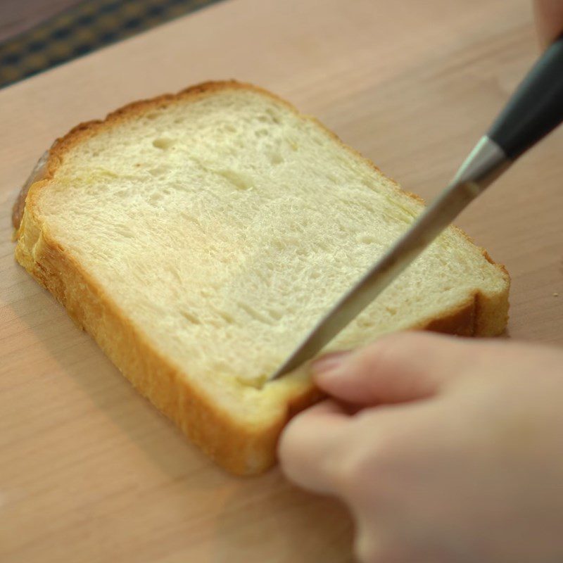 Step 3 Toasting bread with a pan Caramel banana egg toast sandwich