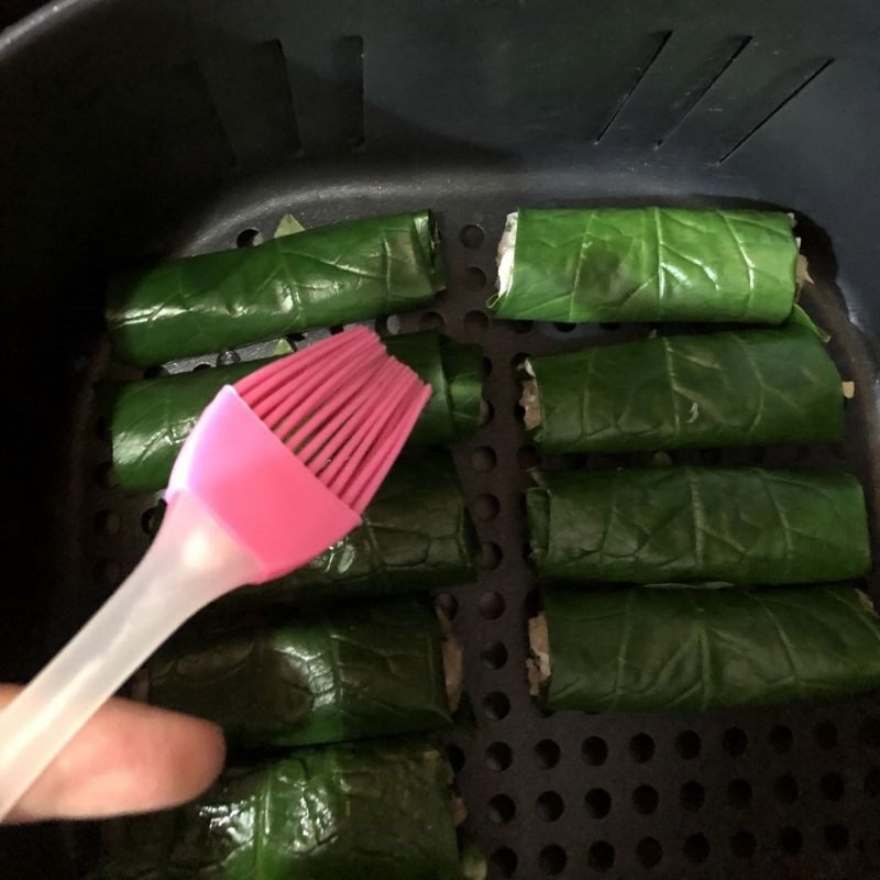 Step 5 Grilling betel leaf fish rolls in an air fryer