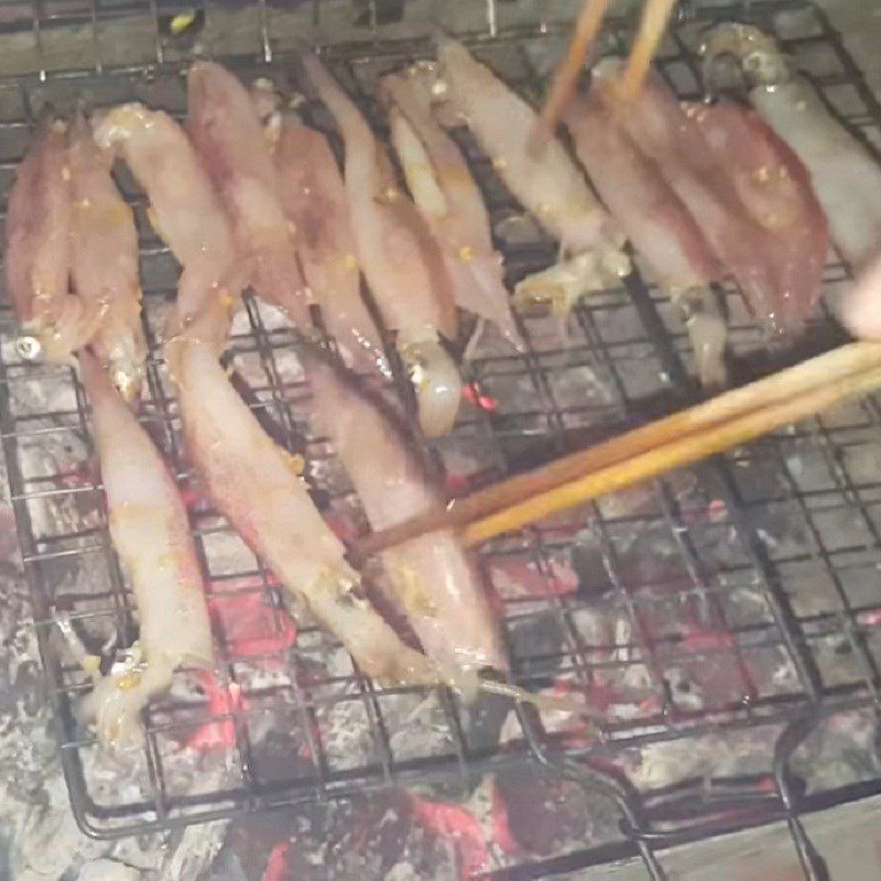 Step 4 Grilling squid Grilled squid with satay