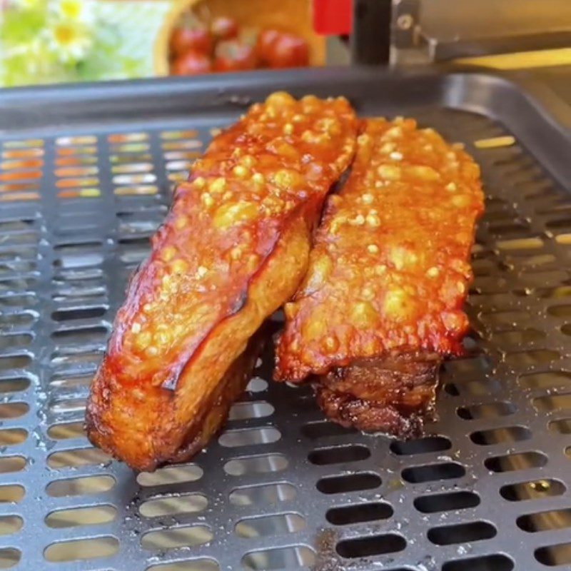 Step 2 Grilling the meat for fried pork belly with mango