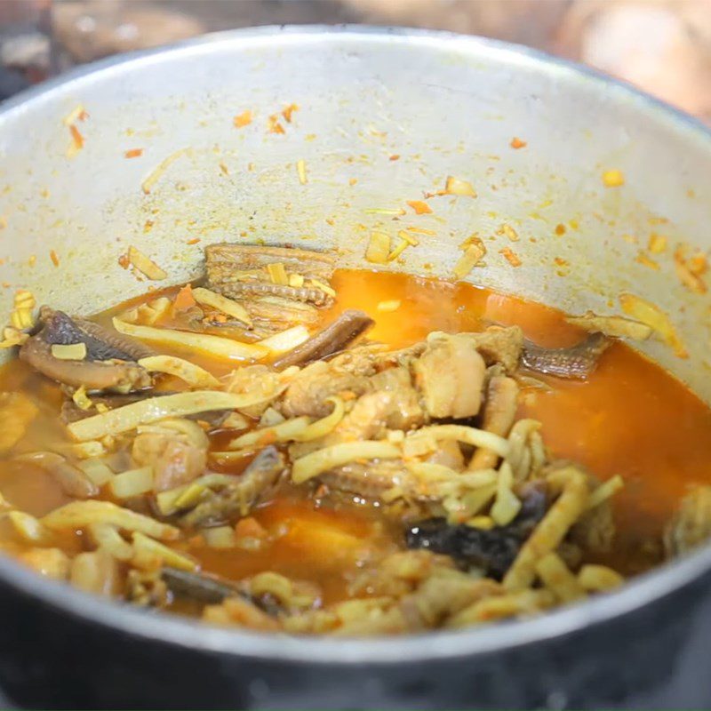 Step 4 Stew the eel Eel with banana flower