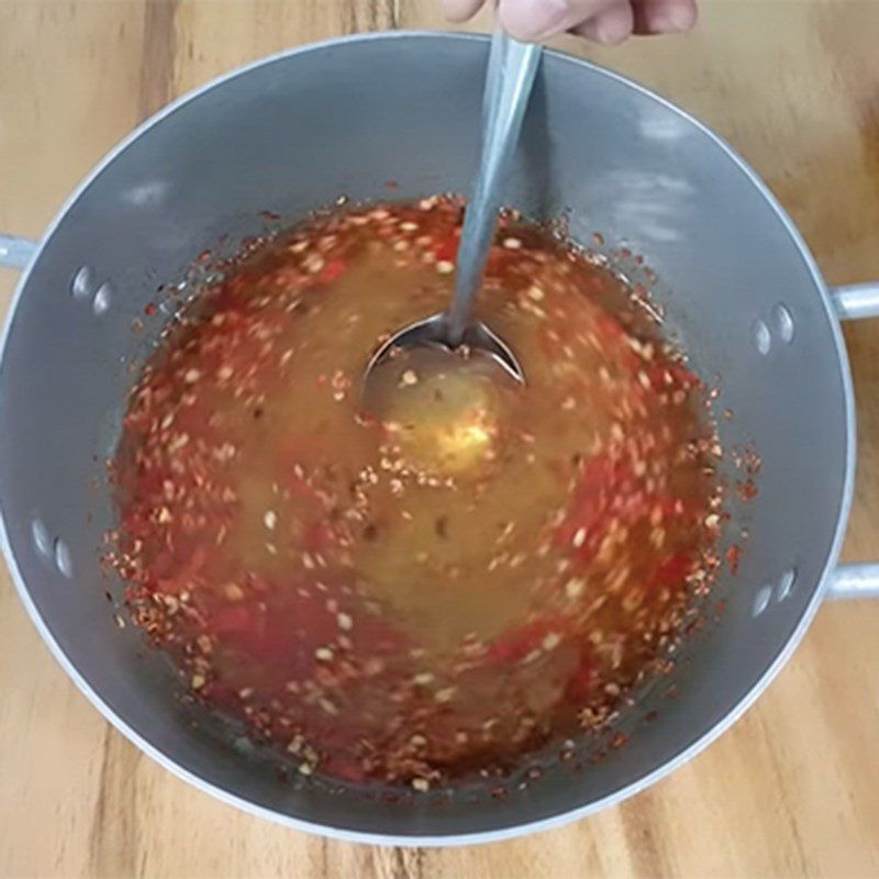 Step 2 Mixing fish sauce Fish sauce with sugar for dipping green mango