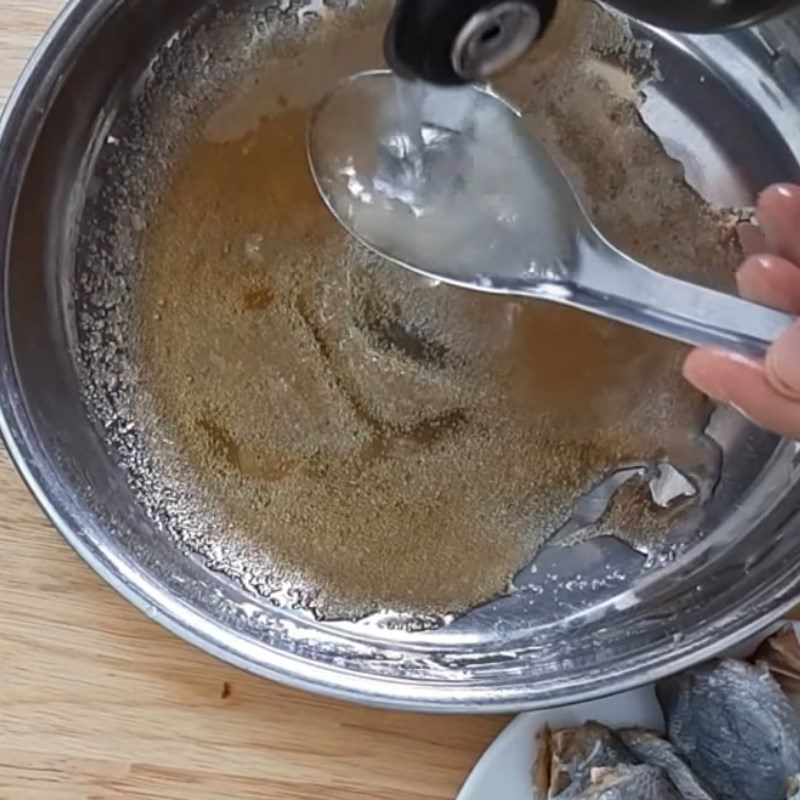 Step 2 Prepare the sauce Dried fish with fish sauce