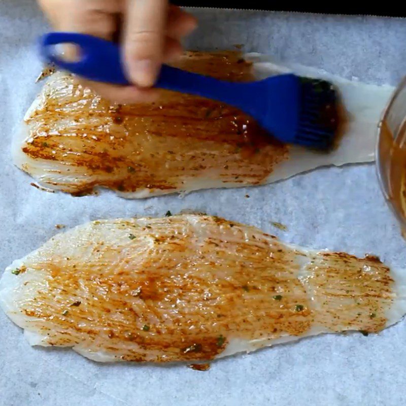 Step 2 Make the sauce and brush it on the fish Grilled basa fish fillet with butter and lemon