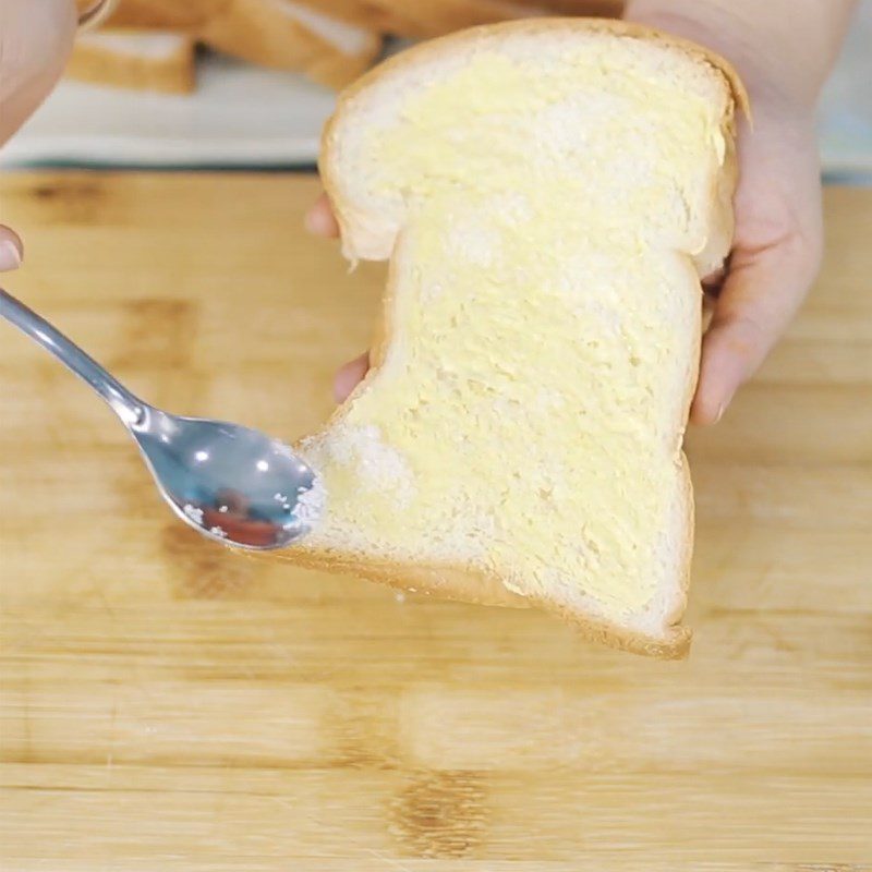 Step 1 Spread butter and sugar on the bread Butter sugar bread made with an air fryer