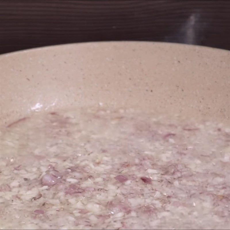 Step 3 Fry onion and garlic for sausage