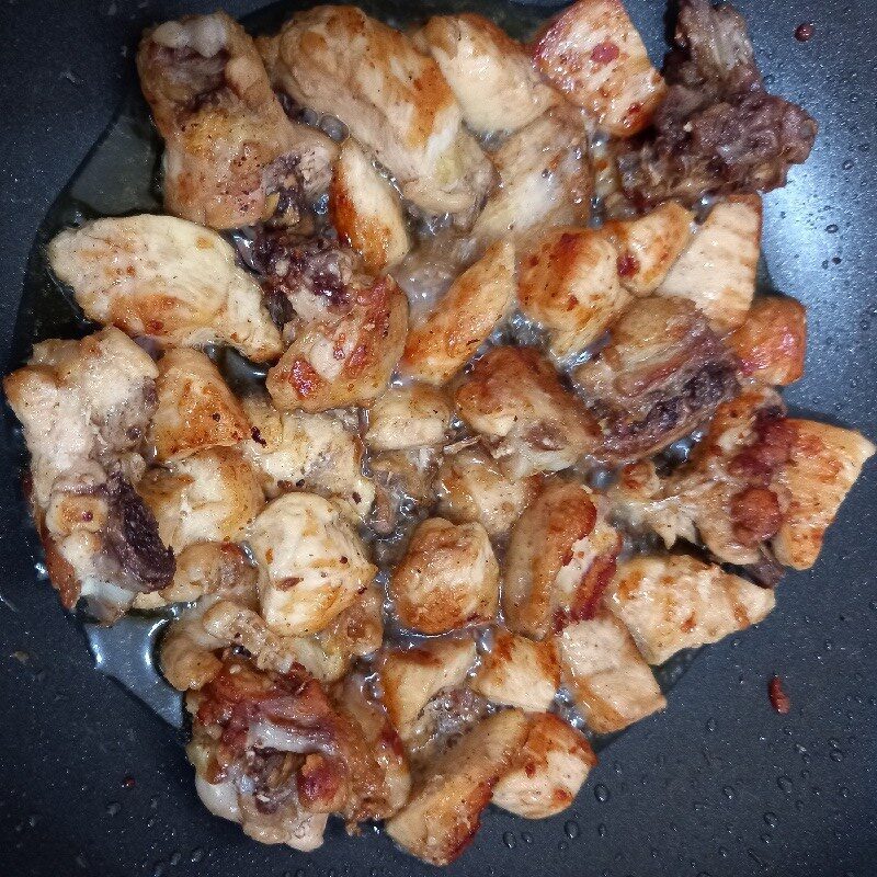 Step 2 Sauté minced garlic and fry chicken Chicken with tamarind