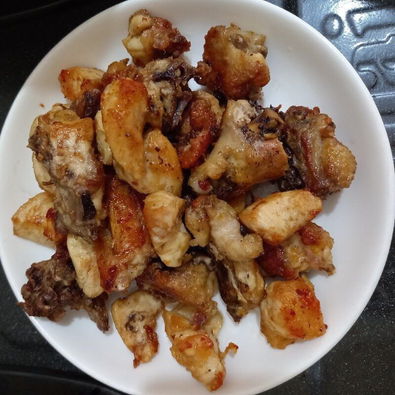 Step 2 Sauté minced garlic and fry chicken Chicken with tamarind