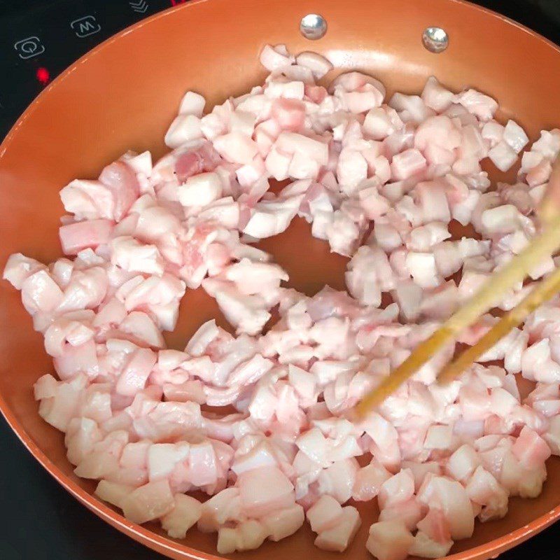 Step 3 Render pork fat Mackerel fish in clay pot