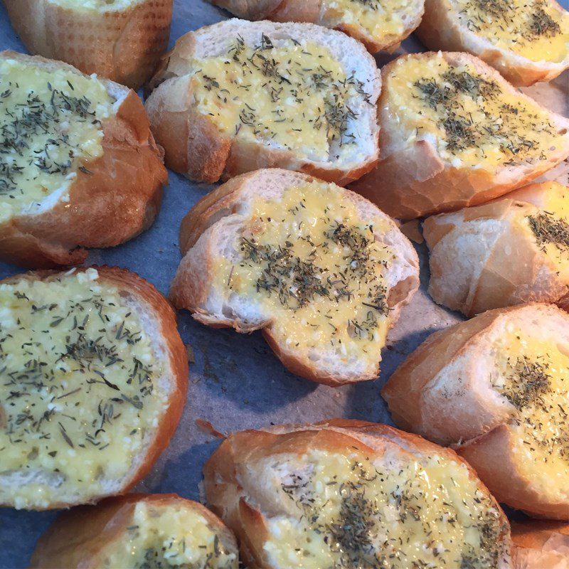 Step 2 Butter Spread and Toasting Garlic Bread