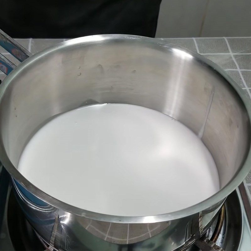 Step 1 Cooking coconut milk Phuc Linh Cake