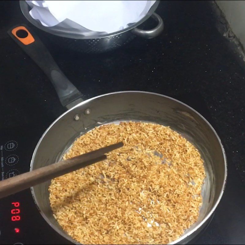 Step 1 Roasting Dried Rice for Dried Rice with Black Sesame Sugar