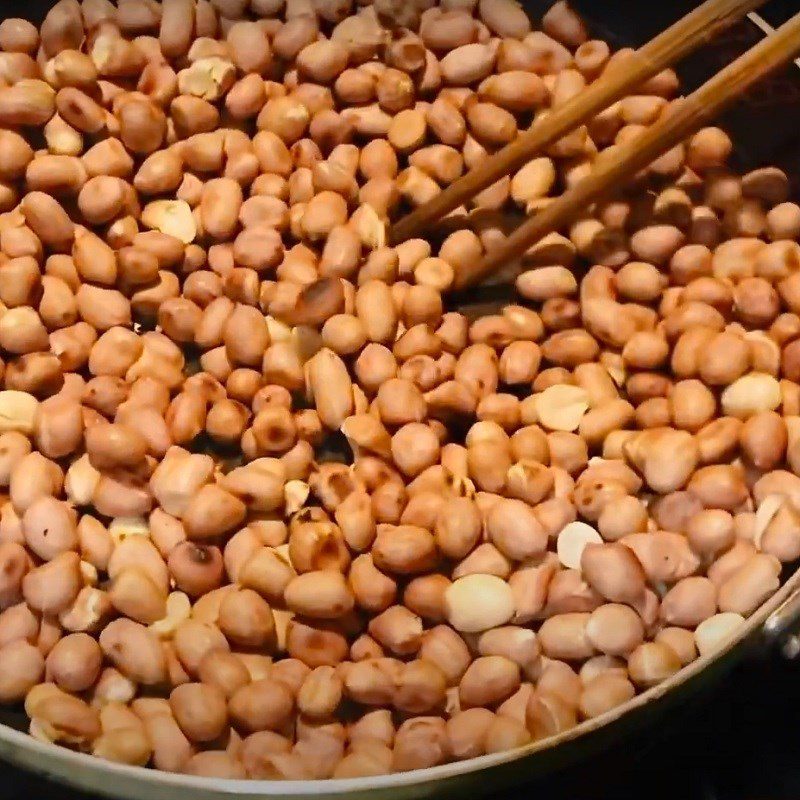 Step 1 Roast peanuts and watermelon seeds for Red Peanut Candy