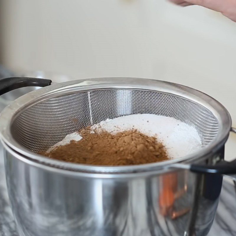 Step 1 Sift the flour mixture for Santa Claus cupcake