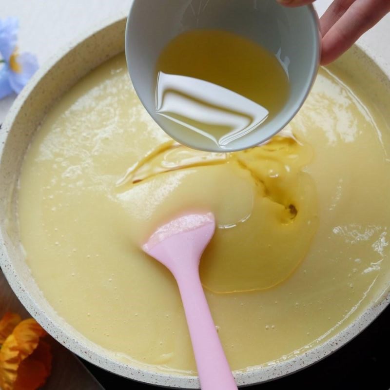 Step 4 Shaping mung bean paste for sticky mooncake with pandan leaves