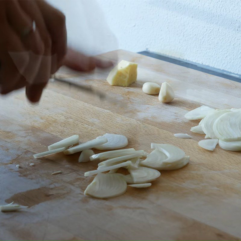 Step 1 Prepare vegetables for Indian chicken curry with mango sauce