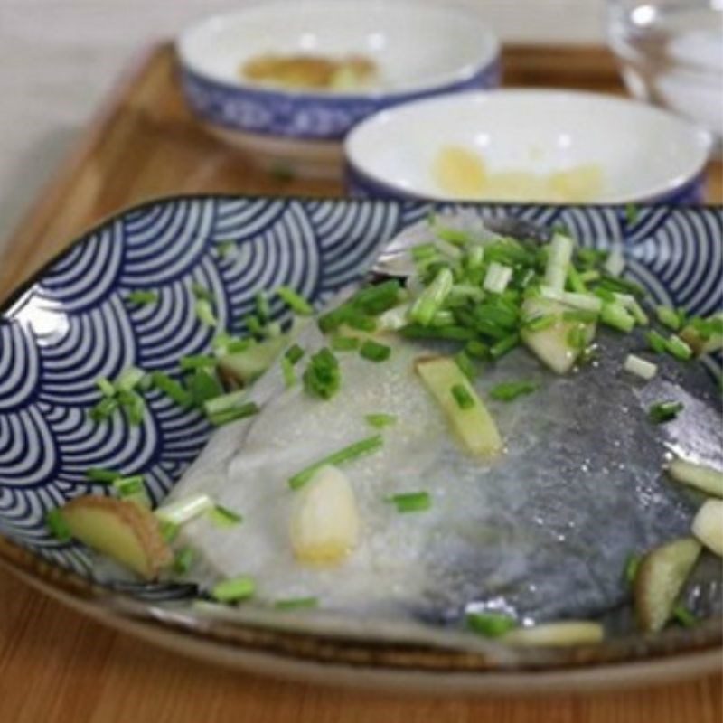 Step 2 Preparing the pomfret Salted pomfret with green onions