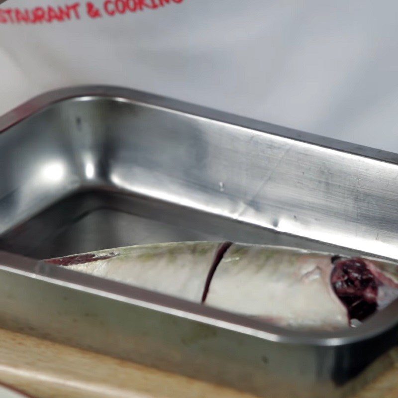 Step 1 Prepare and marinate the catfish Sour bamboo shoot soup with catfish