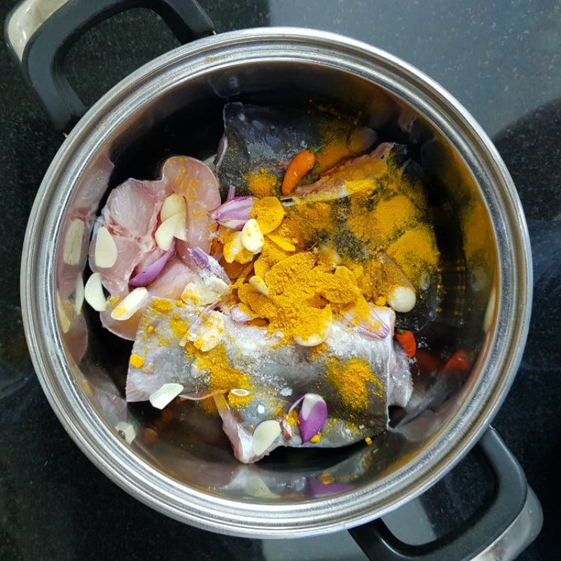 Step 1 Preparing catfish Catfish cooked with turmeric