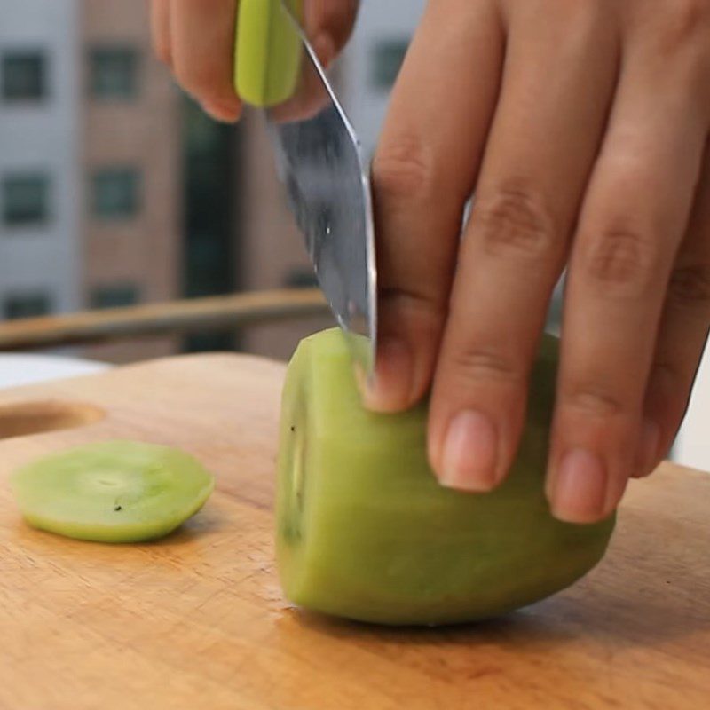 Step 1 Prepare orange, watermelon, kiwi for Orange Water Detox