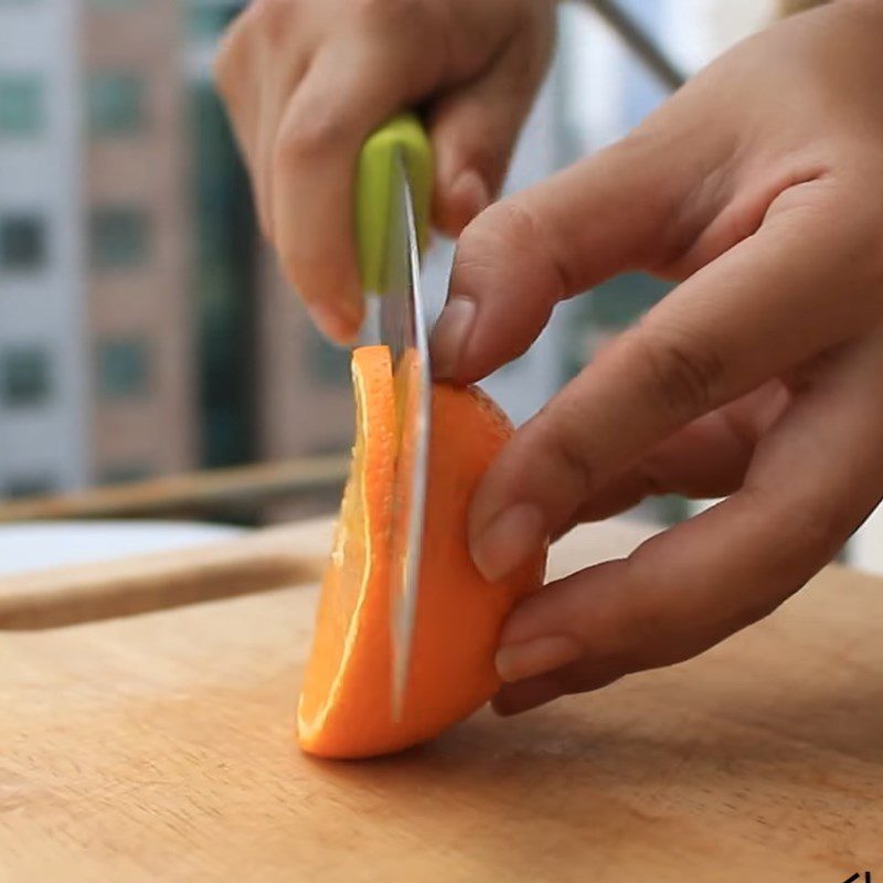 Step 1 Prepare orange, watermelon, kiwi for Orange Water Detox