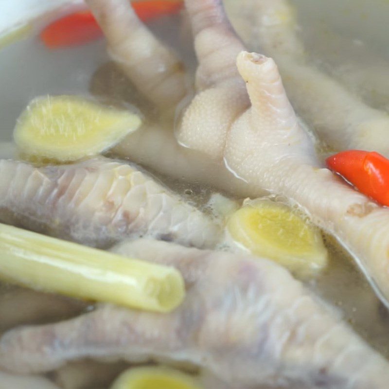 Step 1 Prepare chicken feet Chicken feet soaked in lemongrass and kumquat in Thai style