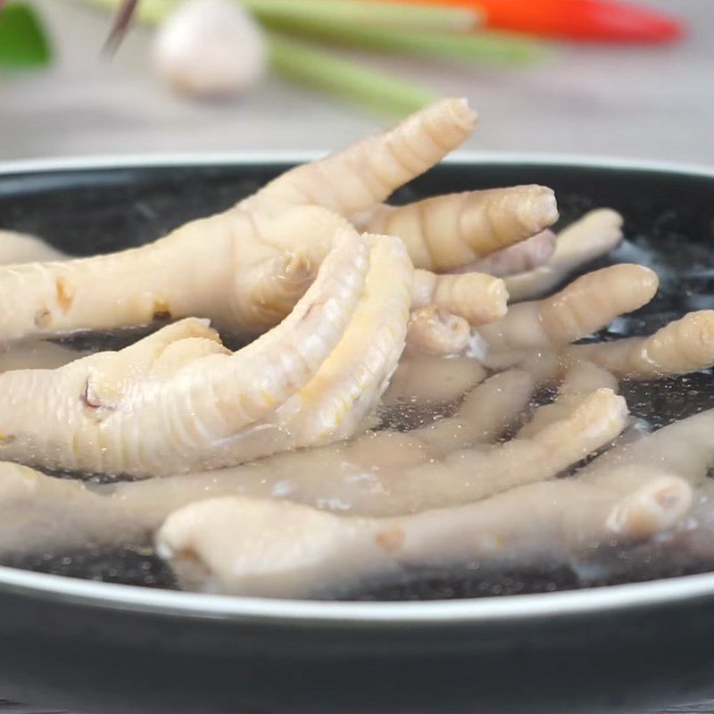 Step 1 Prepare chicken feet Chicken feet soaked in lemongrass and kumquat in Thai style